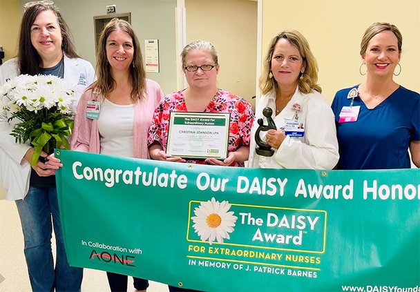 Christina Johnson, center, is shown with the nursing leadership team from East Georgia Regional Medical Center. Johnson received the hospital's latest DAISY Award, which honors the top nurses at the hospital.
