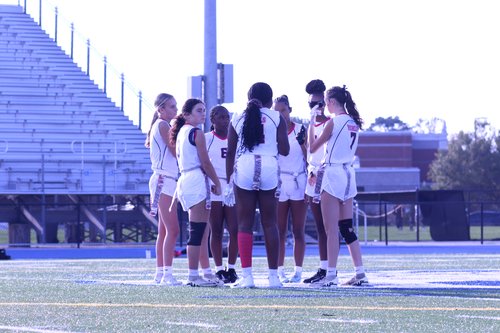 ECHS Flag Football huddle