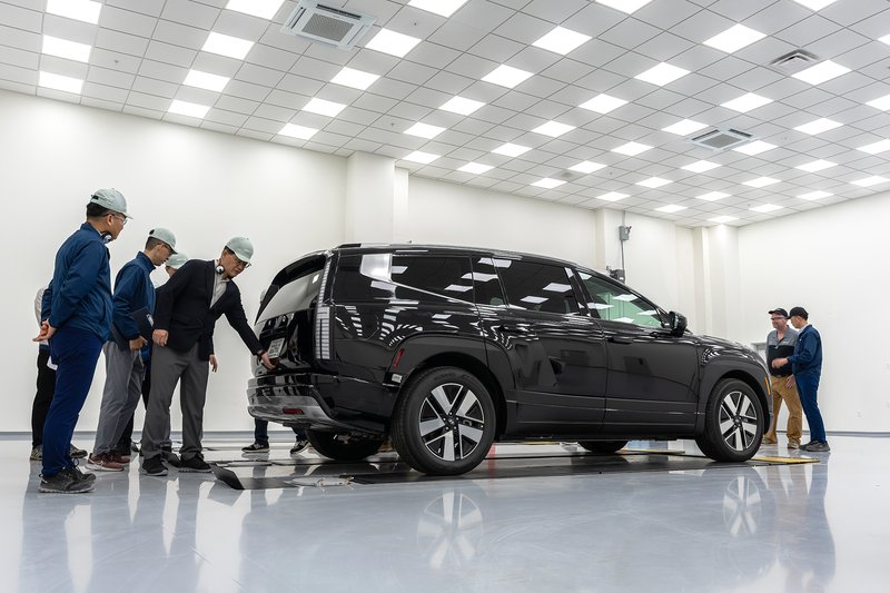 Hyundai officials inspect a completed IONIQ 9.