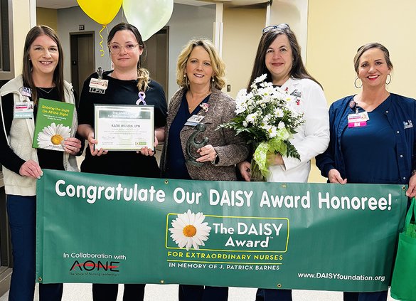 Photo Courtesy East Georgia Regional Medical Center Katie Wilson, LPN, second from left, is shown with the leadership team of the East Georgia Regional Medical Cneter nursing staff after earning the DAISY Award for Extraordinary Nurses.