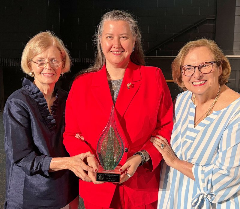 Susan, Nancy, Virginia Anne with Joe McGlamery's award