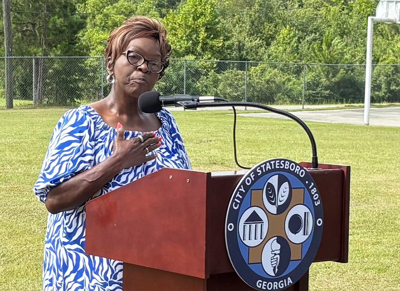 Caroll Hunter speaks about the dedication of her late mother, Carrie Howard, to improving Whitesville Park and the entire community at the groundbreaking Wednesday of renovations at the park.