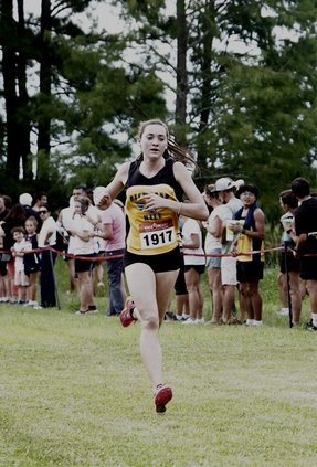 Chloe Miller heading to the finish line in a time of 20:20.77