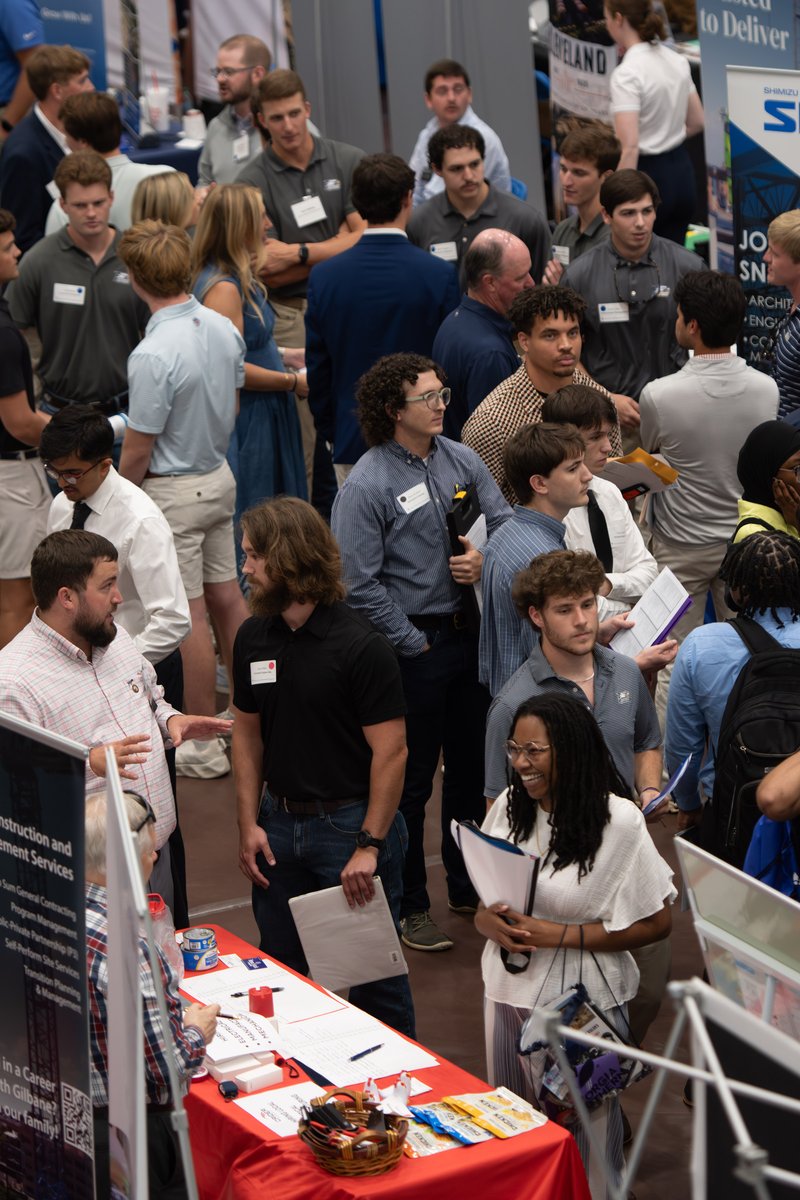 Georgia Southern student Aniya Saulsbury of Warner Robins, lower right, introduces herself at the Crider Foods table as Office of Career and Professional Development Career Showcase Week helped companies meet job-seeking students at the Recreation Activit