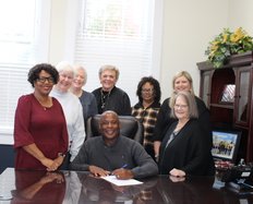 Bulloch County Retired Educators – left to right, President Wihelmina Walker, member Nelda Bishop, President-Elect Gail Dismuke, public relations officer Sandra Kirkland, parliamentarian Pam Bland and communications officer Beth Persinger – gather around