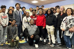 Photos Courtesy Langston Chapel Middle School Statesboro Mayor Johnathan McCollar, center in coat and tie, joined an 8th-grade class at Langston Chapel Middle School for a discussion about the city and his views on the future direction of Statesboro.
