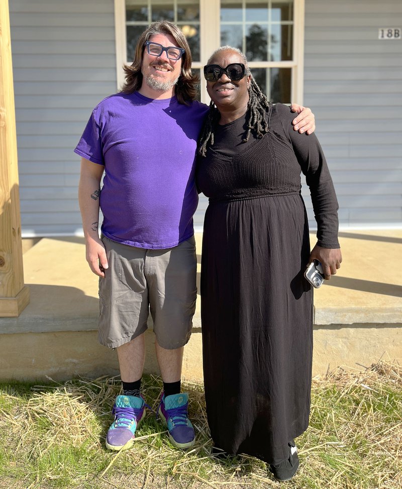 H Aaron Marcinkevich, construnction manager for Habitat for Humanity of Bulloch County, celebrates home built for Lola Harris..jpg