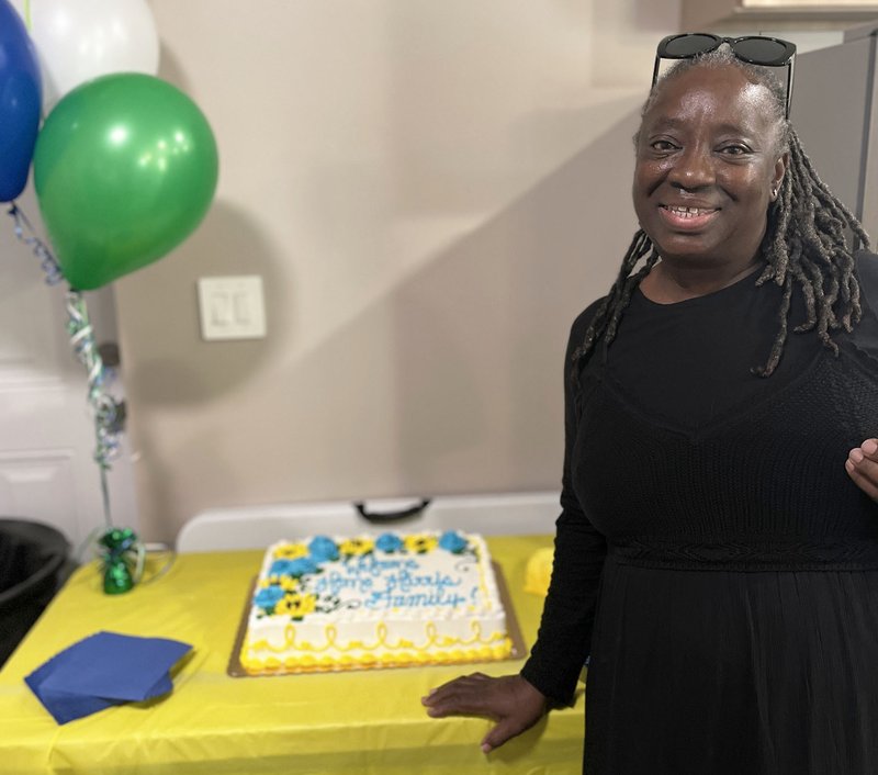 H Lola Harris shares space and cake in her new home..jpg