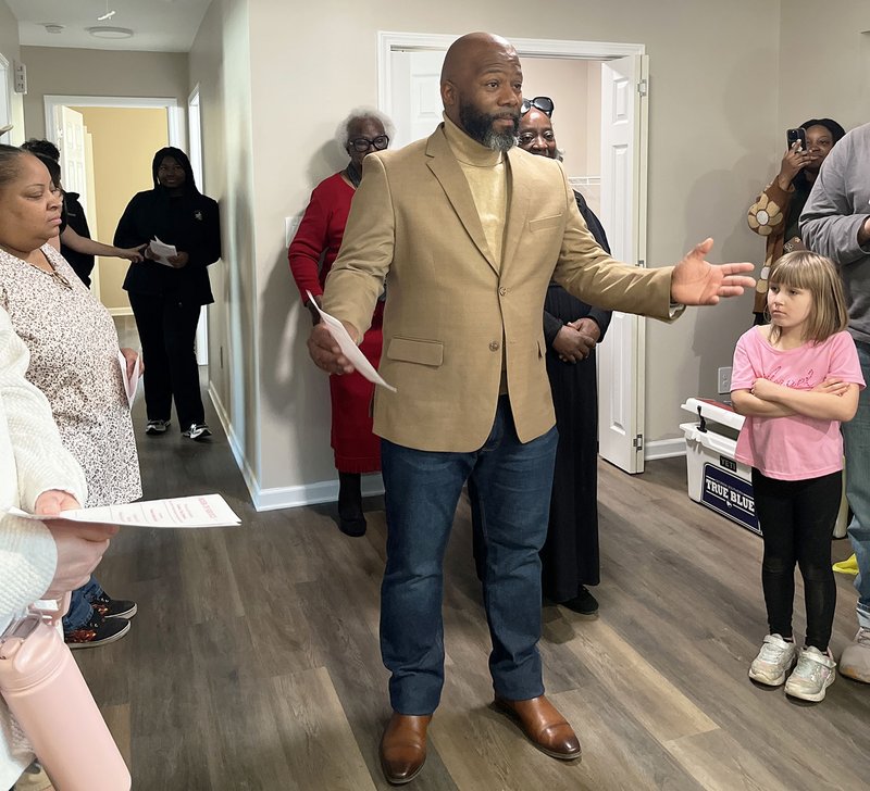 H Pastor Andrew Johnson of Church of God the Bibleway Statesboro, blesses the house with the invocation..jpg