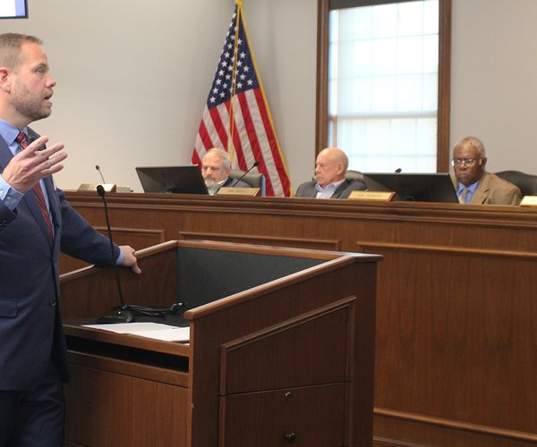 Busbee speaks to commissioners