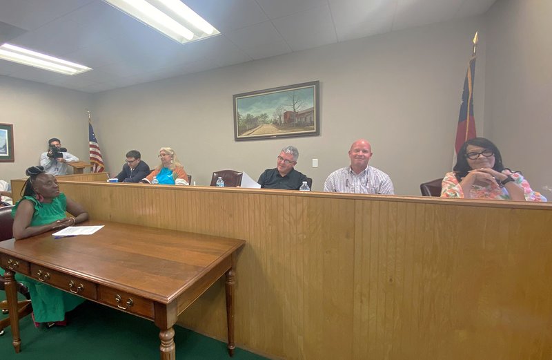 PAM WATERS/staff Pictured Tuesday at the Glennville Ethics Committee meeting in City Hall are, left to right, Glennville City Attorney Drew Johnson, City Clerk Delilah Bryant, Ethics Committee members Quentin McArthur, Dr. Paul Thompson and Linda Gail Thomas. Glennville City Council member Cynthia Miller is seated at the table.