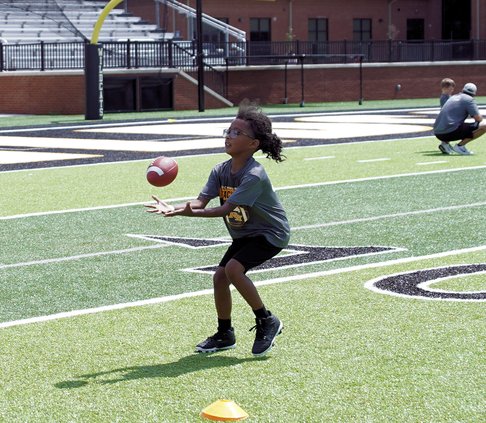 RHHS hosts football skills camp for kids