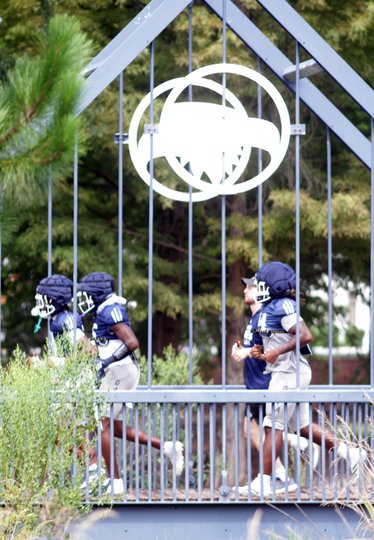 GA Southern players cross Eagle Creek one more time