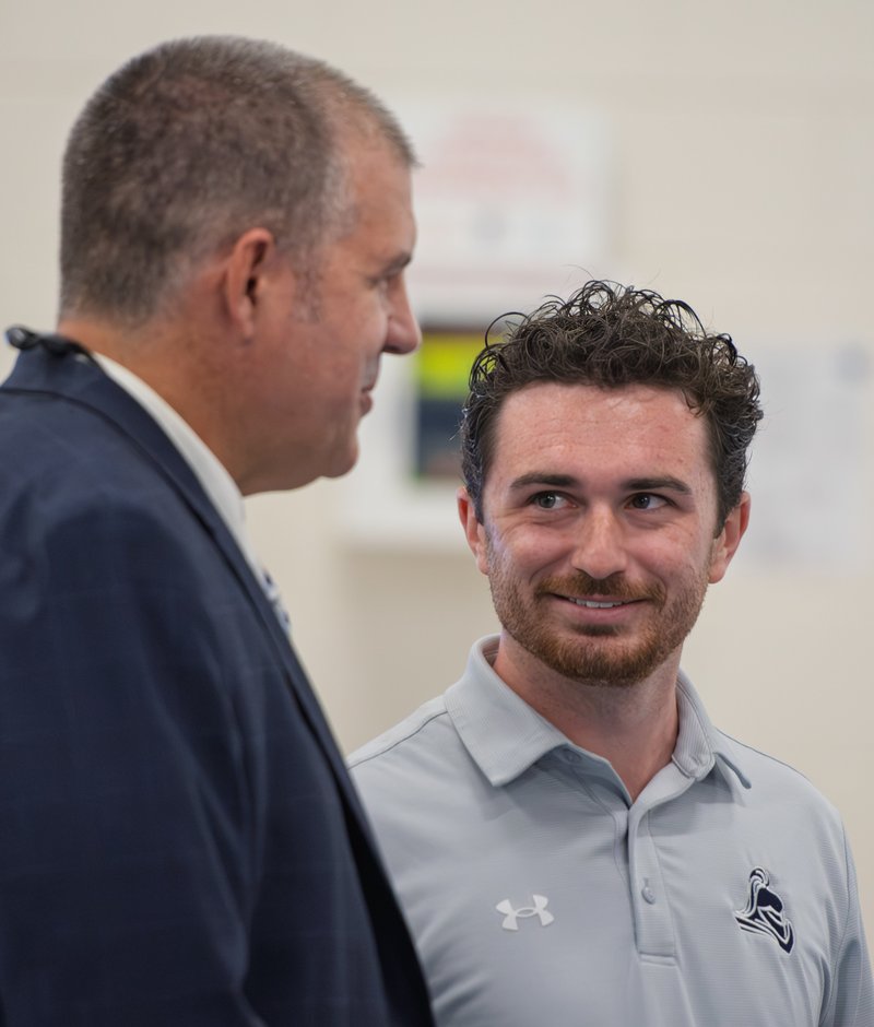 After being named the 2026-27 Bulloch County Schools Teacher of the Year Zach Barrow chats with principal John McAfee.