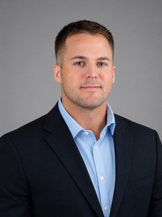 logan irvine headshot