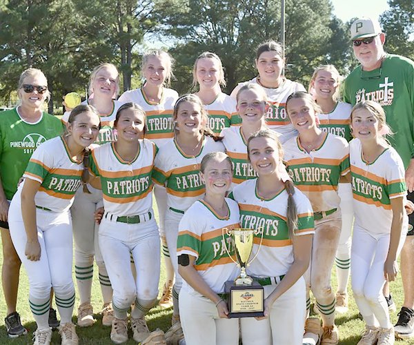 coaches with trophy and team.jpg